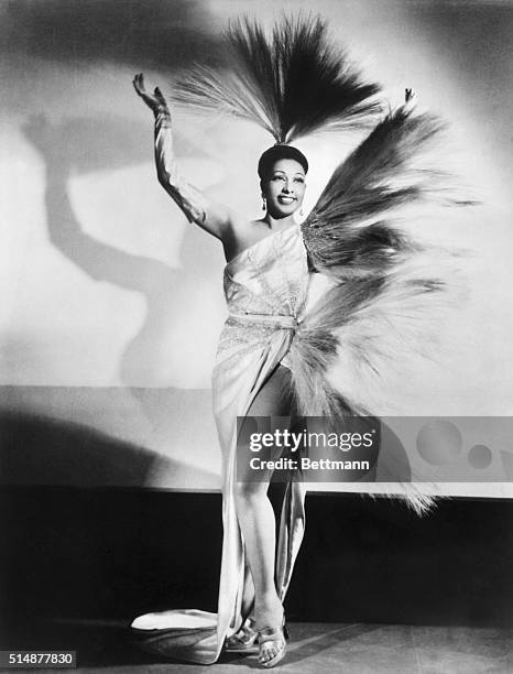 Josephine Baker in feathered gown.