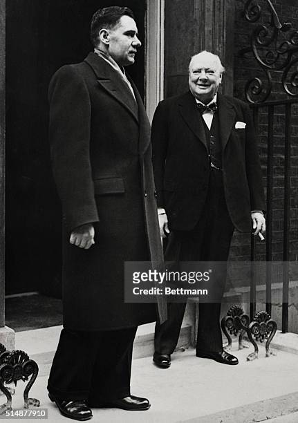 London, England: Britain's Prime Minister, Winston Churchill, sports a smile as he and Andrei Gromyko, U.S.S.R. Ambassador to Britain, posed on the...