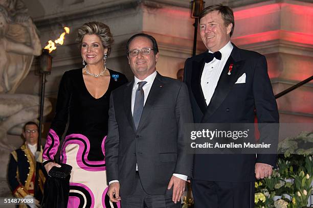 King Willem-Alexander of the Netherlands, Queen Maxima and French President Francois Hollande arrive to a reception given by King Willem-Alexander of...