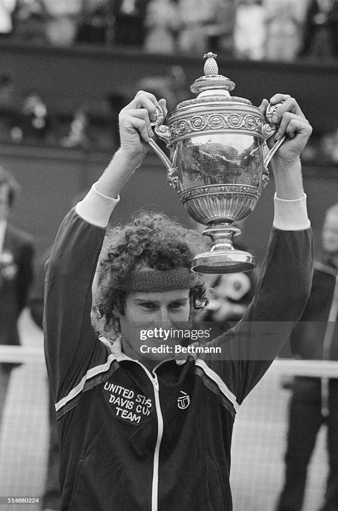 McEnroe Showing Off Wimbledon Trophy