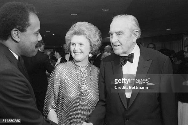 Averell Harriman and his wife Pamela arrive at a $500 per plate benefit dinner sponsored by the Democratic Party in honor of Averell's 90th Birthday....