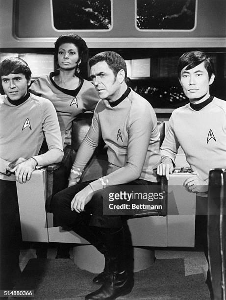 Aboard the main deck of the USS Enterprise are : Chekov , Uhura , Scotty , and Sulu .