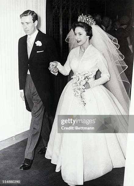 Princess Margaret and her new husband Antony Armstrong-Jones leave Westminister Abbey after their wedding.