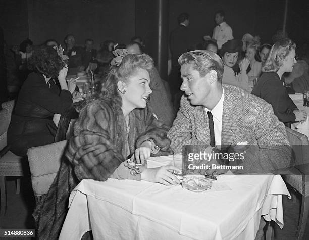 Hollywood, CA: Actress Ann Baxter and actor Peter Lawford at the Hollywood Palladium.