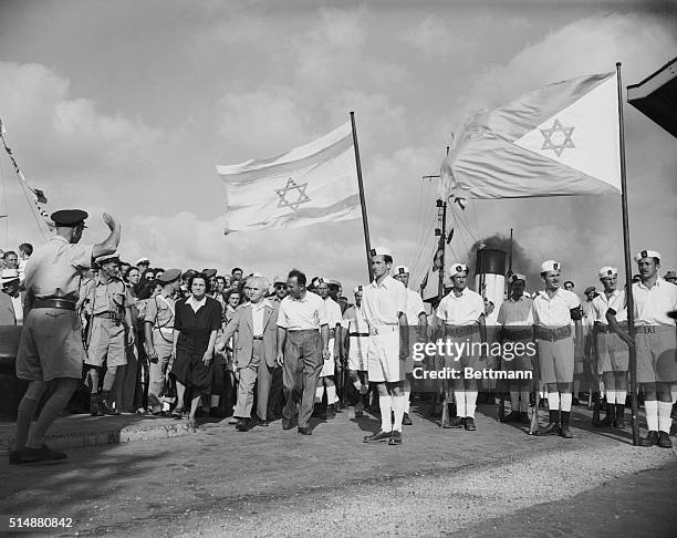 Haifa, Palestine: Israel's Prime Minister wishes the British a bon voyage. Israel's Prime Minister, David Ben Gurion, with his wife and friends, was...