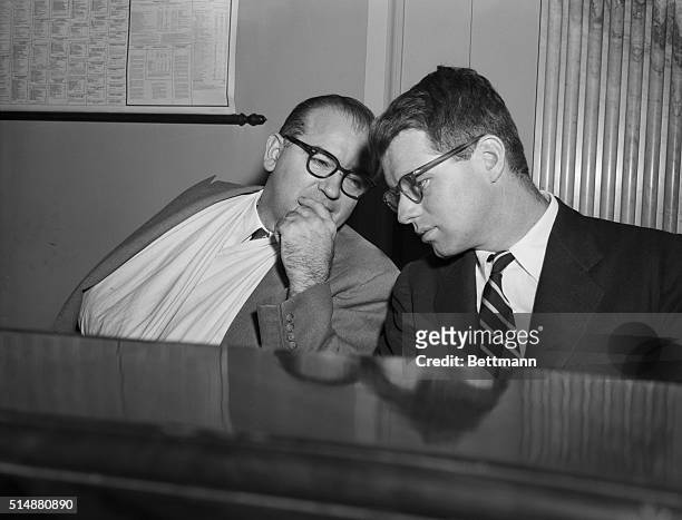 Washington, DC: Chairman Joseph R. McCarthy , of the Senate Investigations Subcommittee, confers with Robert Kennedy, open hearing today since the...