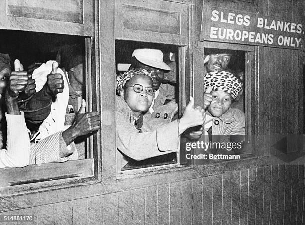 Cape Town, South Africa: In flat definace of Prime Minister Malan's white supremacy laws and their rigid segregation rules, these South African...