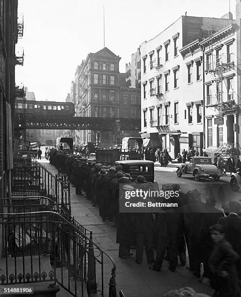 S-New York, NY: Long bread line in the New York Bowery during the Depression.