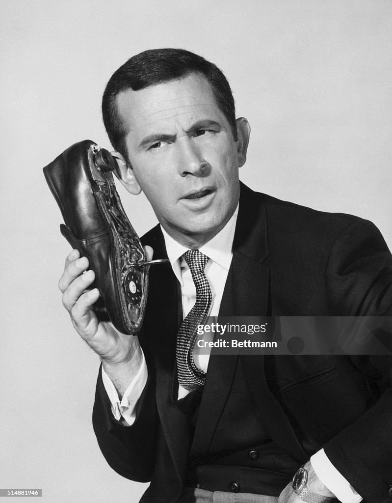 Actor Don Adams with Shoe-Phone