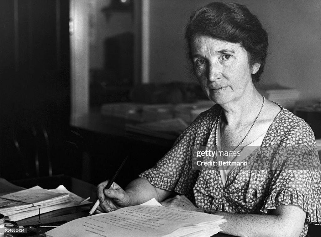 Margaret Sanger Seated at Desk