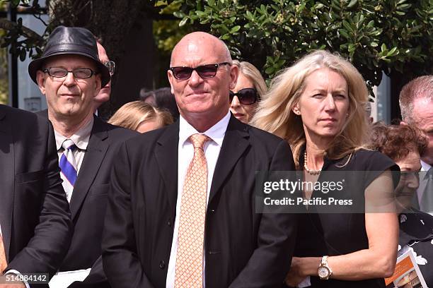 Martin Crowe's brother Jeff Crowe looks on when Martin's casket is loaded into the hearse.New Zealand cricketing legend Martin Crowe passed away at...