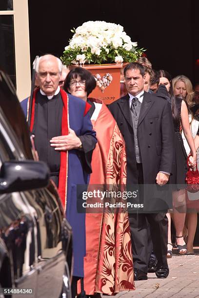 The casket carrying the former captain Martin Crowe at Holy Trinity Cathedral is loaded to loaded into the hearse at the end of the funeral. New...