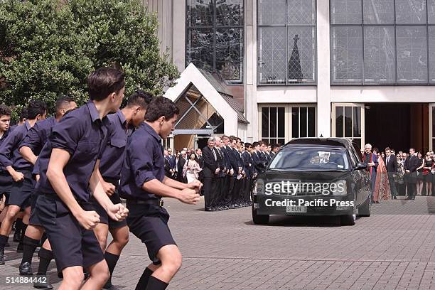 Students of Auckland Grammar performed 'Hogan's haka' to honour the cricketing great as his casket was led away at his funeral. New Zealand...