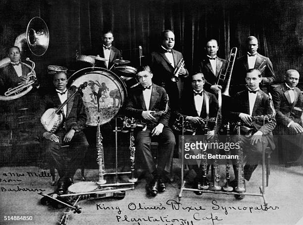 "King" Oliver was the cornet player and band leader who brought Louis Armstrong from New Orleans to Chicago, helping to make jazz a more widespread...