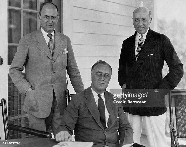 From left to right are Secretary of the Treasury Henry Morgenthau Jr., US President Franklin D. Roosevelt, and A. Forbes Morgan.