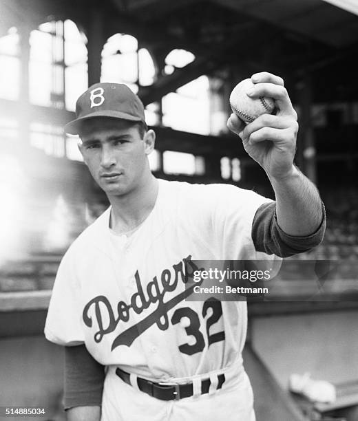 Sandy" Koufax pitching.