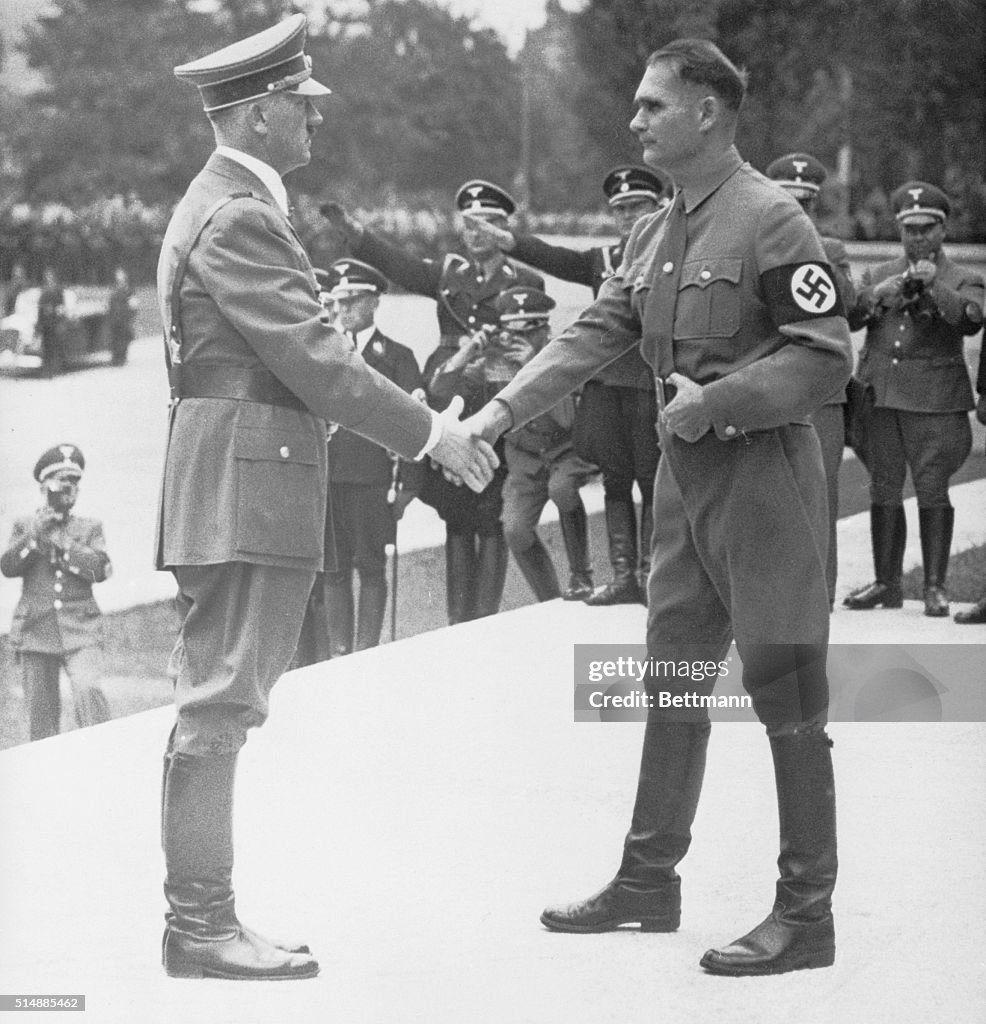 Hitla Hand Chancellor Hitler, shaking hands with his deputy, Rudolf Hess, who ...