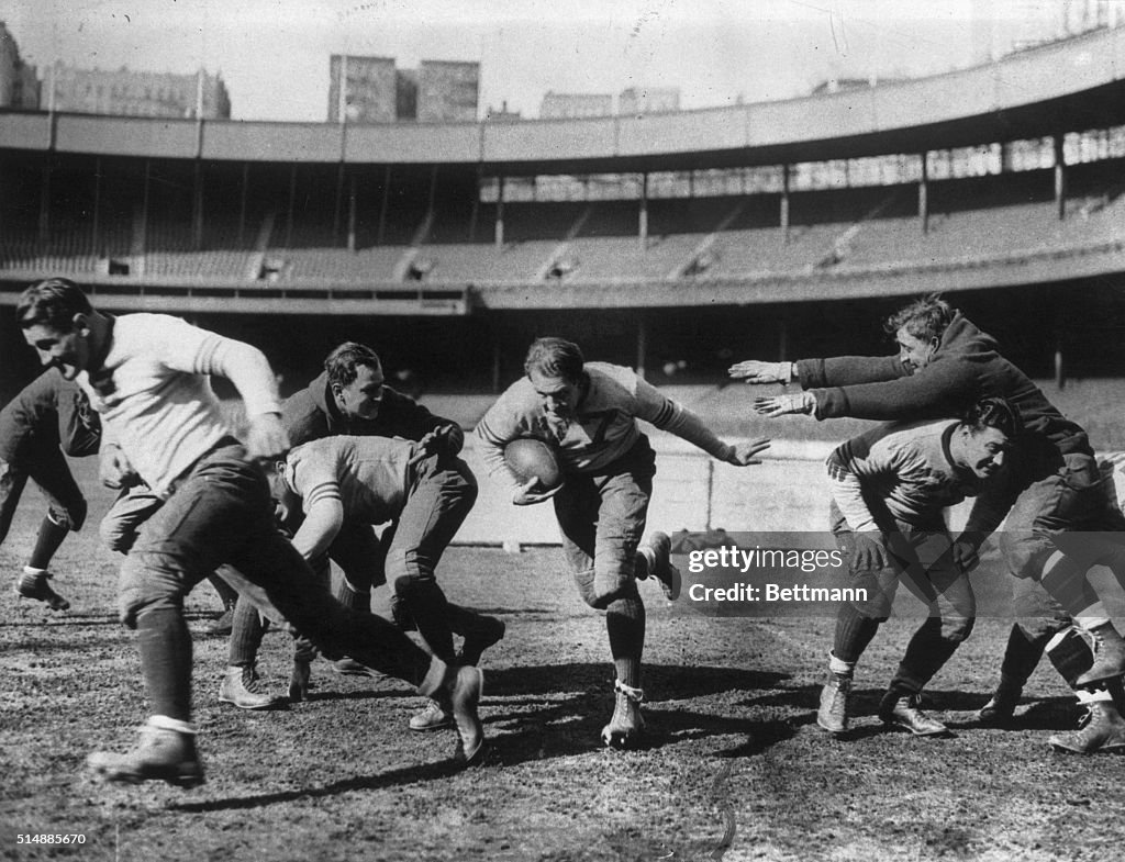 Red Grange Playing Football