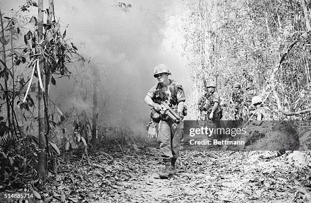 Tay Ninh, South Vietnam: Men of the U.S. First Cavalry Division in a jungle area ten miles from the Cambodian border during a six hour fight...