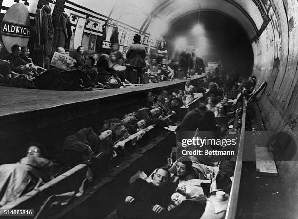 Residents of London sleep on the platform and tracks at a subway station. The tunnel was converted to an air raid shelter after German attacks on the...