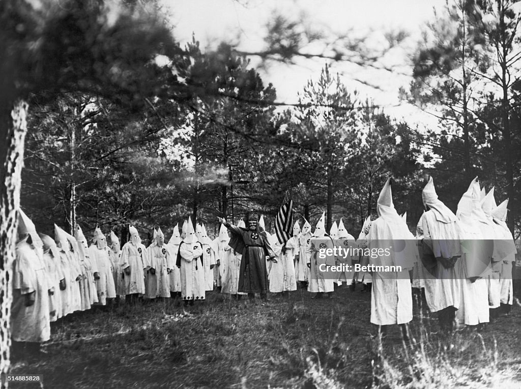 Meeting Of The Kkk In Wooded Area In Day