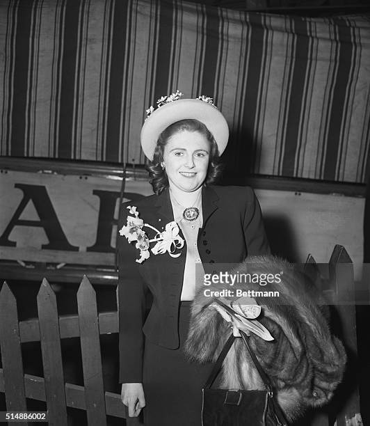 New York, NY: Mrs. Pamela Churchill, daughter-in-law of Winston Churchill, is shown shortly before embarking on the Queen Mary in New York April 7....