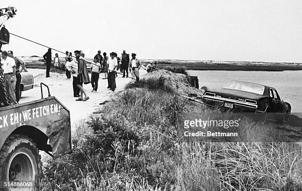 Tow truck pulls Senator Edward Kennedy's car out of Poucha Pond after the Senator's infamous accident on Chappaquiddick Island.