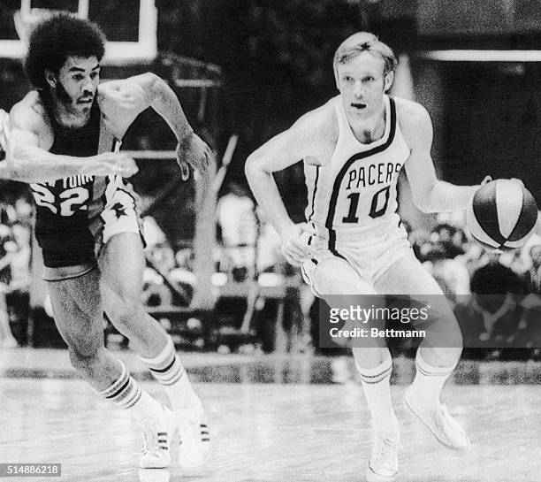 Ollie Taylor of the New York Mets chases Indiana's Rick Mount down court in an American Basketball Association playoff game.