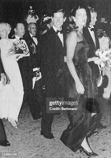 Princess Caroline of Monaco and her husband Stefano Casiraghi followed by Prince Charles of Britain arrive at the Opera at Monaco to attend a recital...