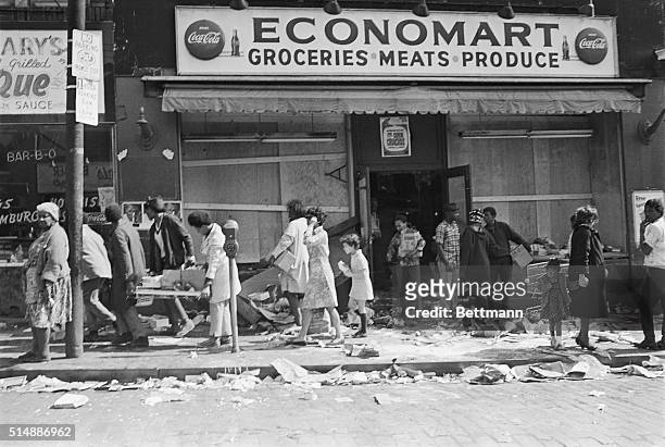 Looters in Pittsburgh cart off merchandise from a market. 4/7 marked the third day of sporadic disturbances in the city. The disturbances caused...