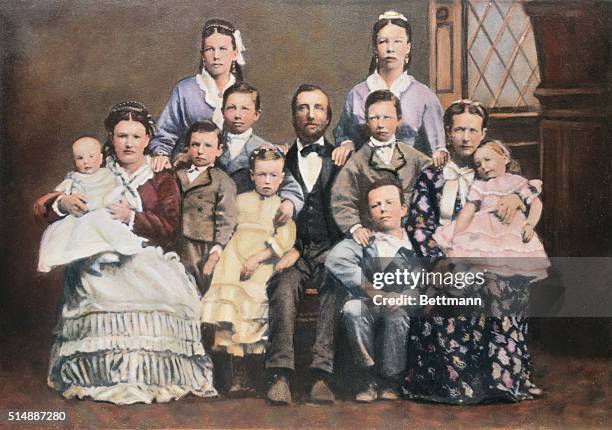 Mormon family with two wives and nine children, 19th century photograph.