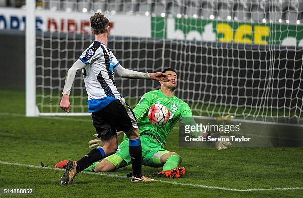 West Ham Goalkeeper Raphael Spiegel makes a diving save from Sean Longstaff of Newcastle United's strike towards goal during the Barclays U21 Premier...