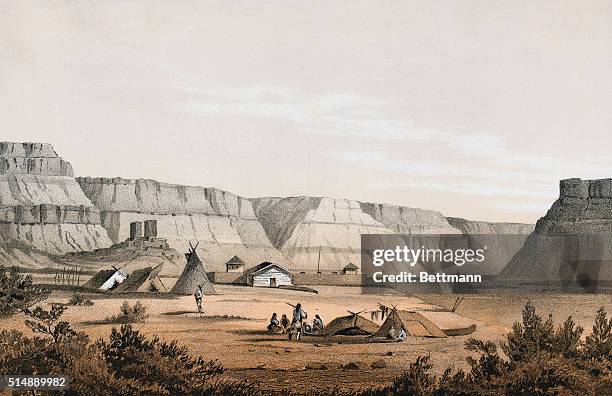 Old Fort Walla Walla. Undated color lithograph by Stanley Del. Indian camp in foreground with mesas in desert background. Color slide.