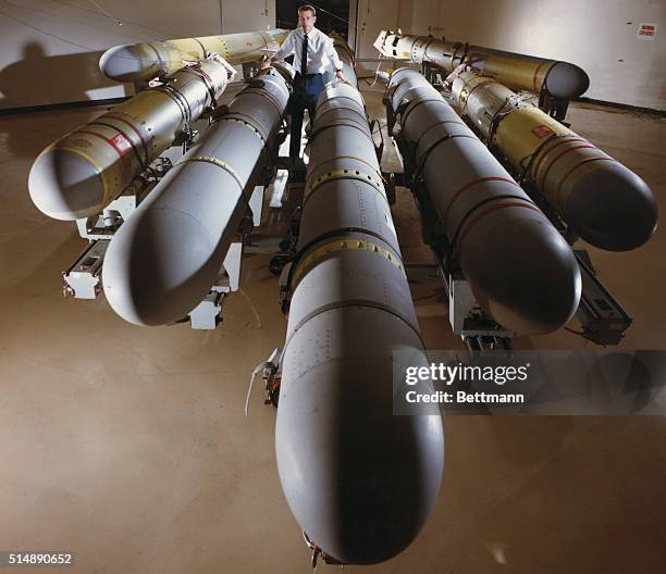 Production Supervisor Duane Daugherty is inspecting the Tomahawk cruise missiles that have reached the end of the production line at General Dynamics...