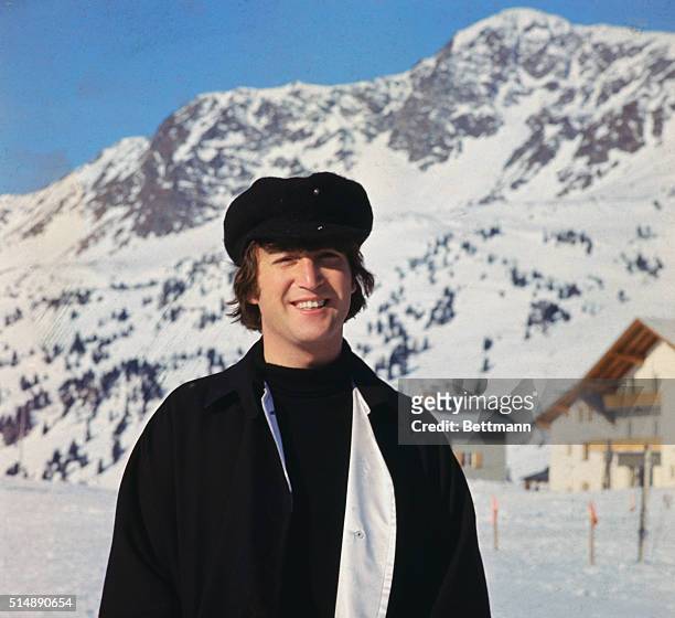John Lennon posing on ski slopes for United Artist's Help! Directed by Richard Lester, the musical/comedy stars the Beatles, 1965.