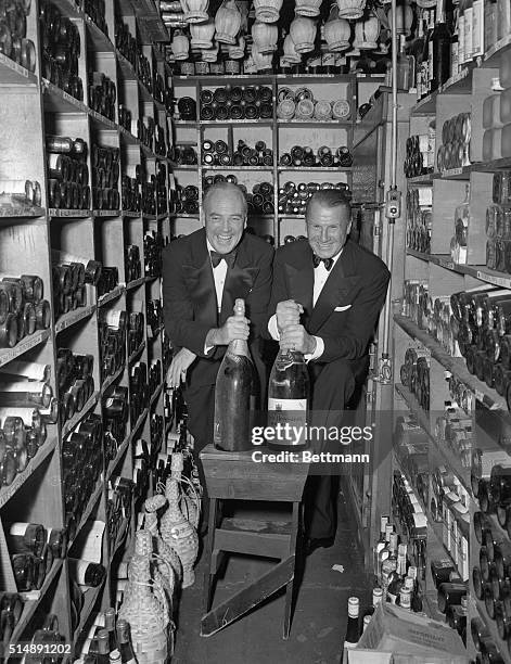 Owner John Perona poses in the wine cellar of his famous New York City nightclub, El Morocco, at 154 East 54th Street.