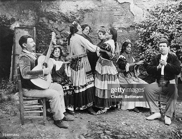 Dance of the gypsies in Granada, Spain. Four women dance to guitar.