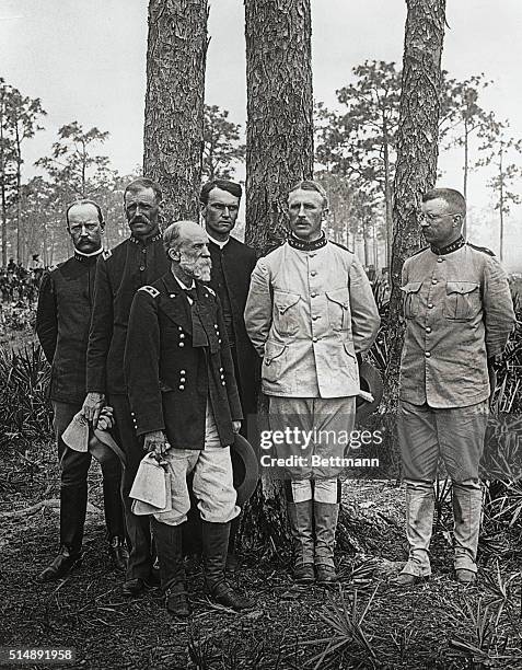 Left to Right: George Dann, Major Brodie, General Joseph Wheeler, Chaplain Brown, Col. Leonard Wood, and Lt. Col. Teddy Roosevelt.