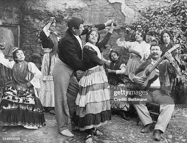 Dance of the Gypsies in Granada, Spain. Man and woman dance to guitar and castinets.