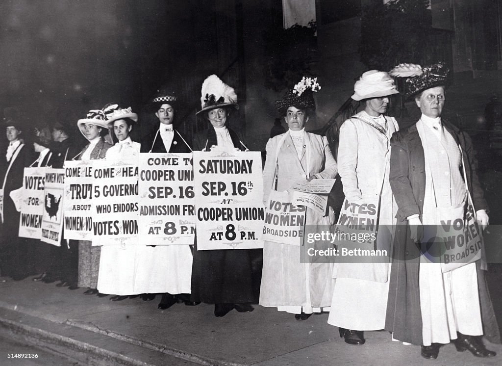 Suffragettes Marching with Signs