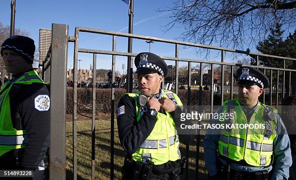 Chicago Police offciers stand before the start of Republican Presidential candidate Donald Trump Rally at the UIC Pavilion on March 11, 2016 in...