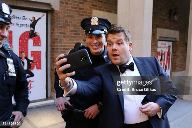 James Corden films a "Carpool Karaoke" promo for "The Late Late Show with James Corden" in Times Square on March 11, 2016 in New York City.