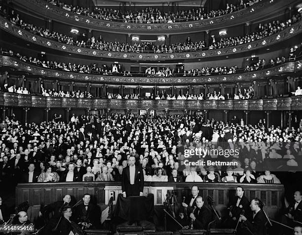 New York, NY: Interior of the Metropolitan Opera House, New York City, showing orchestra in foreground and audience in back. Undated photograph....