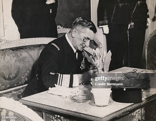 Hungary: Miklos Horthy , Hungarian admiral & Statesman, signing papers at his desk.