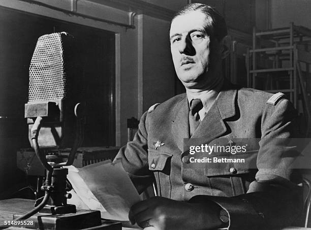 Charles de Gaulle addressing his countrymen during the German occupation. Photograph in front of microphone.