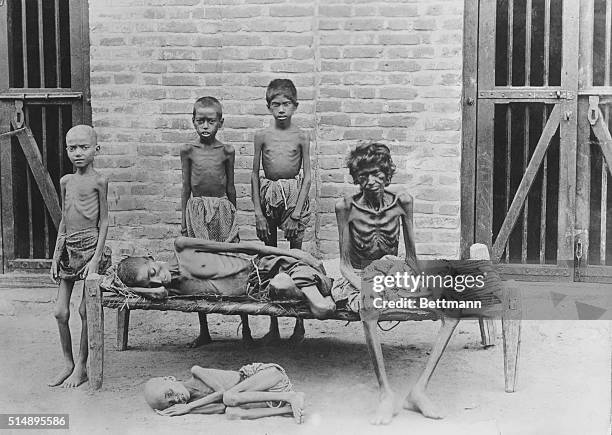 Famine in India. A starving family.