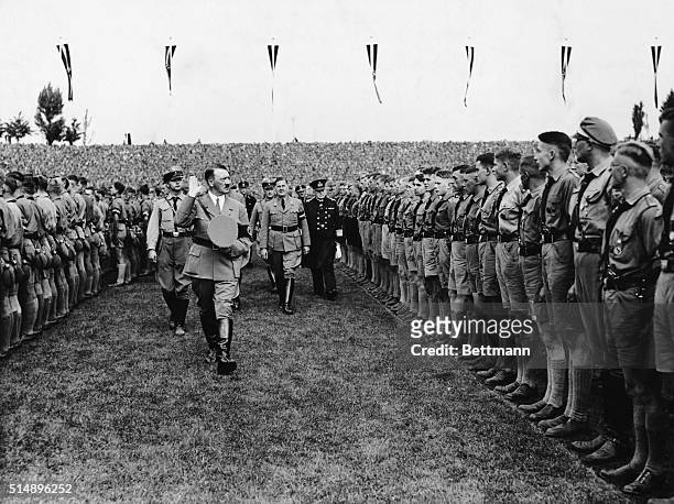 Hitler followed by Youth Leader Baldur Von Schirach and Admiral Von Trotha as he reviewed thousands of Hitler Youth who gathered in the stadium at...