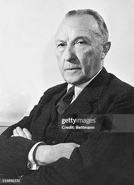 Adenauer, Chancellor of Germany.