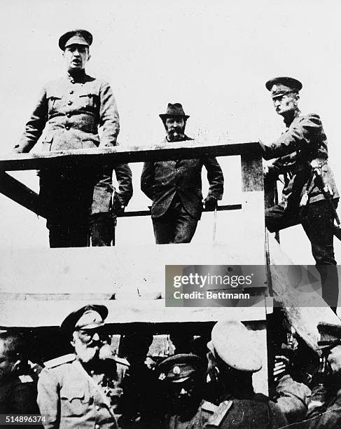 Aleksandr Kerensky, Prime Minister of the Russian provisional government, addresses a crowd of soldiers from a platform. Standing behind the Prime...