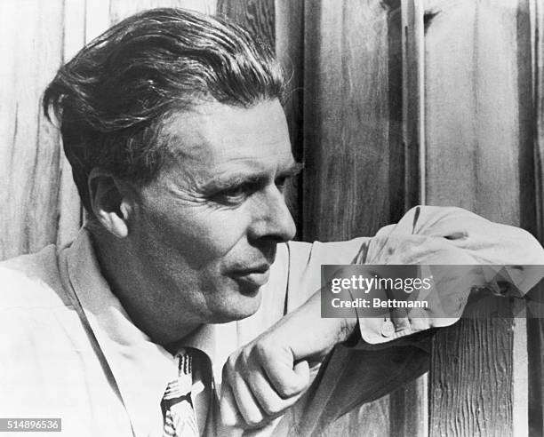 Head and shoulders portrait of writer and philosopher Aldous Huxley. Huxley is wearing shirtsleeves and tie. Undated photograph circa 1950.